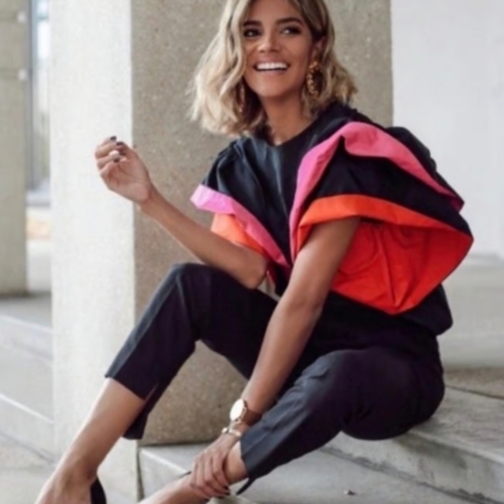 ZARA black silk top with exaggerated sleeves rolled up with hot pink and orange